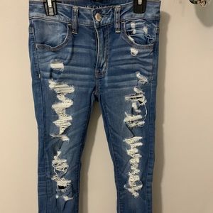 Distressed low waisted jeans